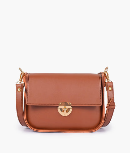 Brown saddle bag with twist lock